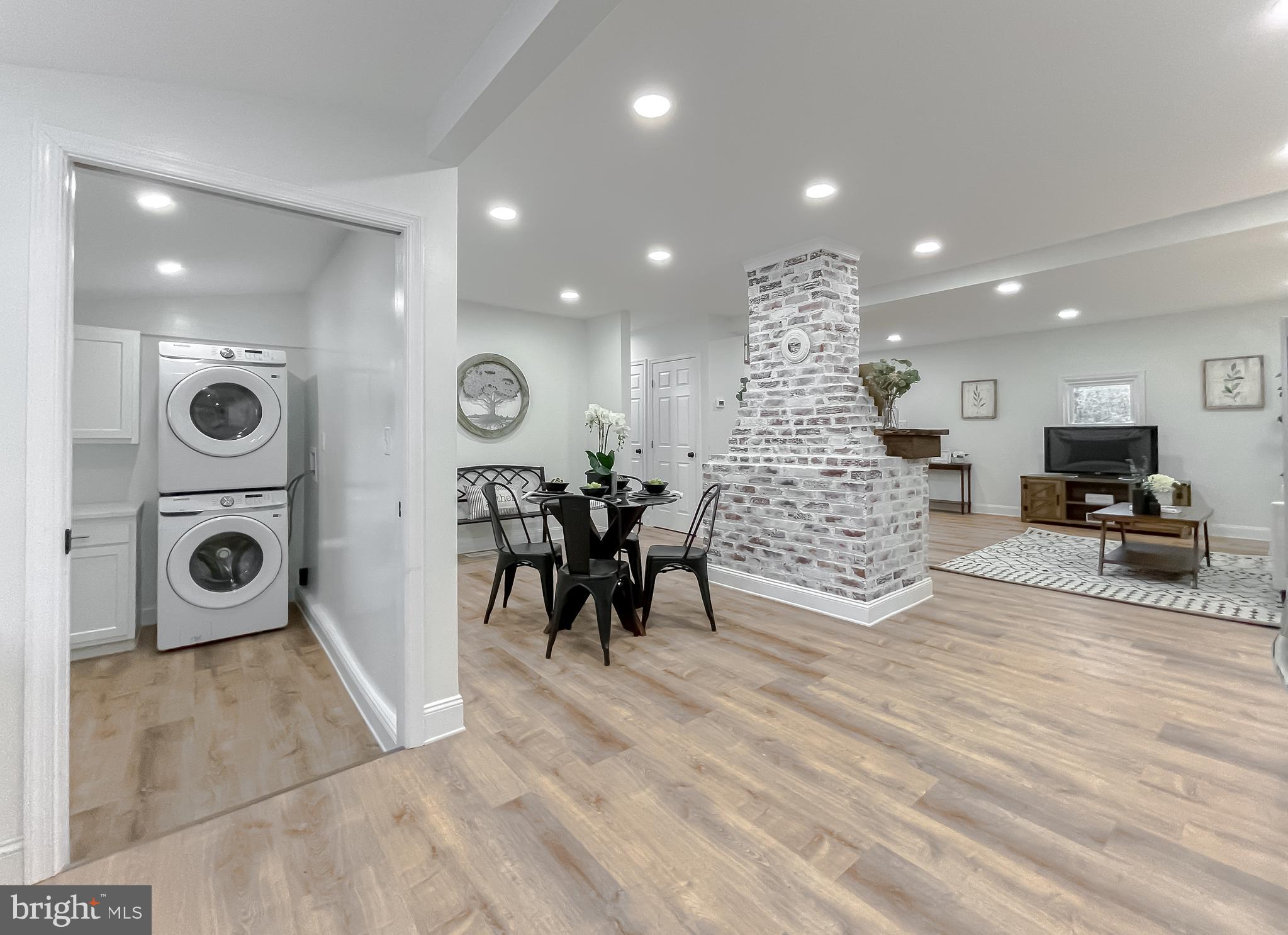 8285 Verne Place Welcome, MD 20693 - Photo 16 of 54 a living room with furniture and a wooden floor