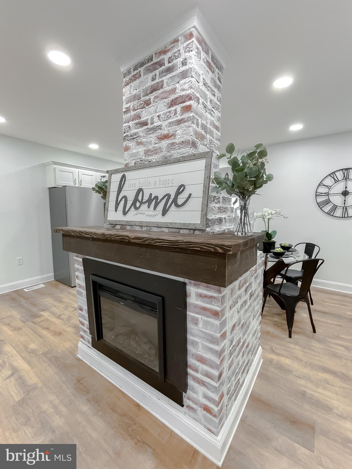 8285 Verne Place Welcome, MD 20693 - Photo 18 of 54 a kitchen with a stove and a table