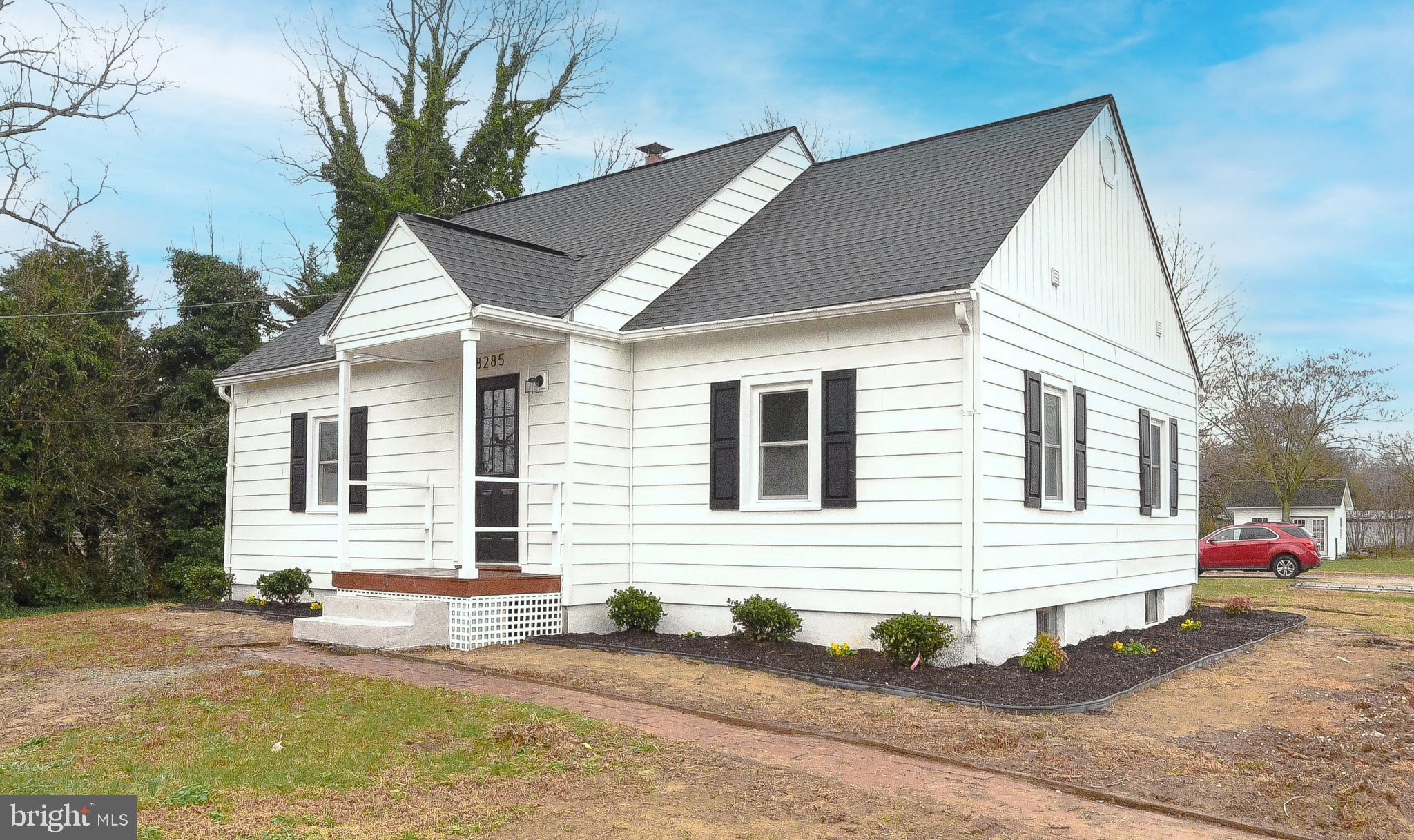 8285 Verne Place Welcome, MD 20693 - Photo 2 of 54 a front view of a house with a yard and garage