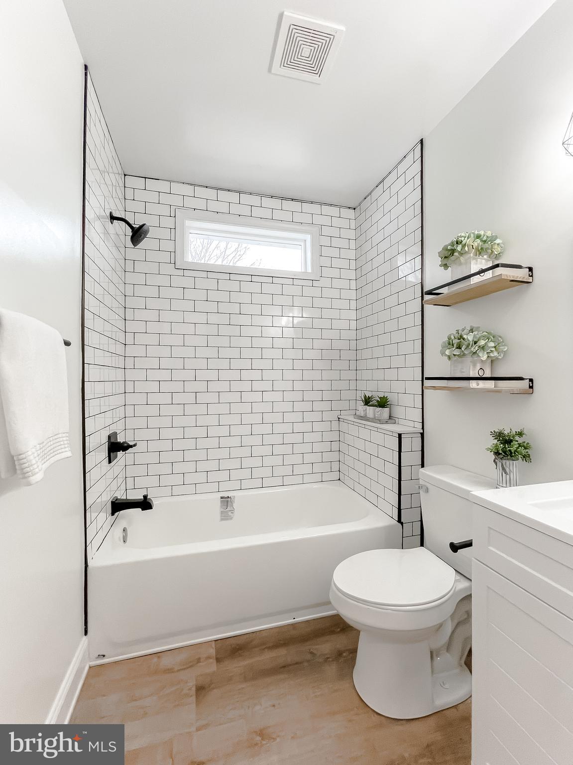 8285 Verne Place Welcome, MD 20693 - Photo 26 of 54 a bathroom with a toilet and a bath tub