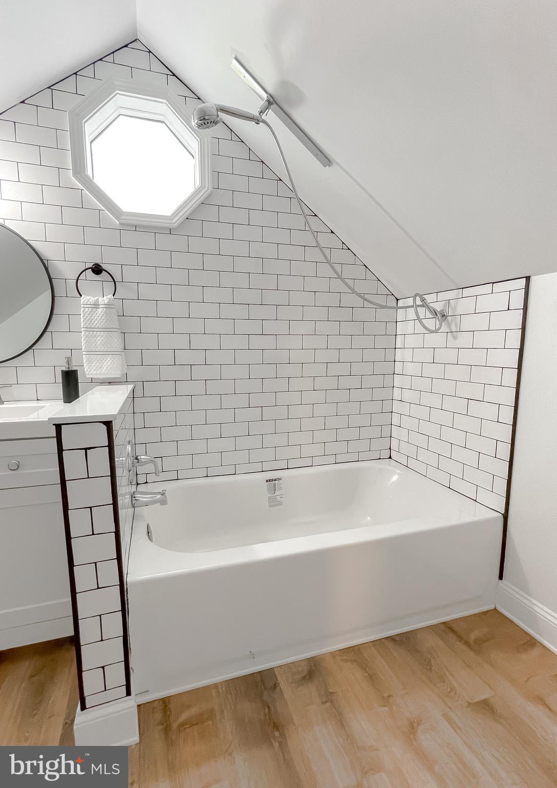 8285 Verne Place Welcome, MD 20693 - Photo 31 of 54 a bathroom with a bathtub and a sink