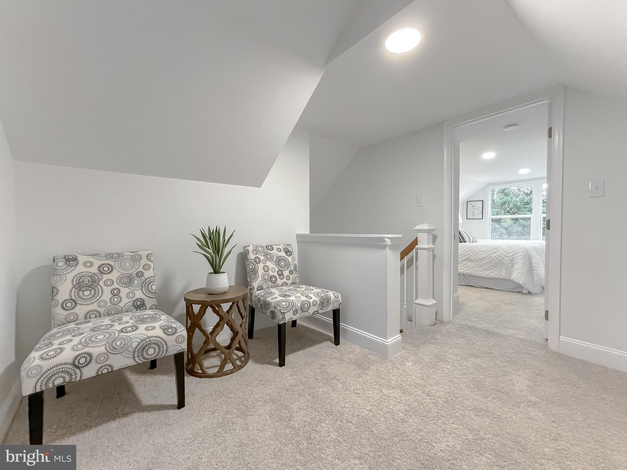 8285 Verne Place Welcome, MD 20693 - Photo 44 of 54 a bedroom with furniture and a chandelier