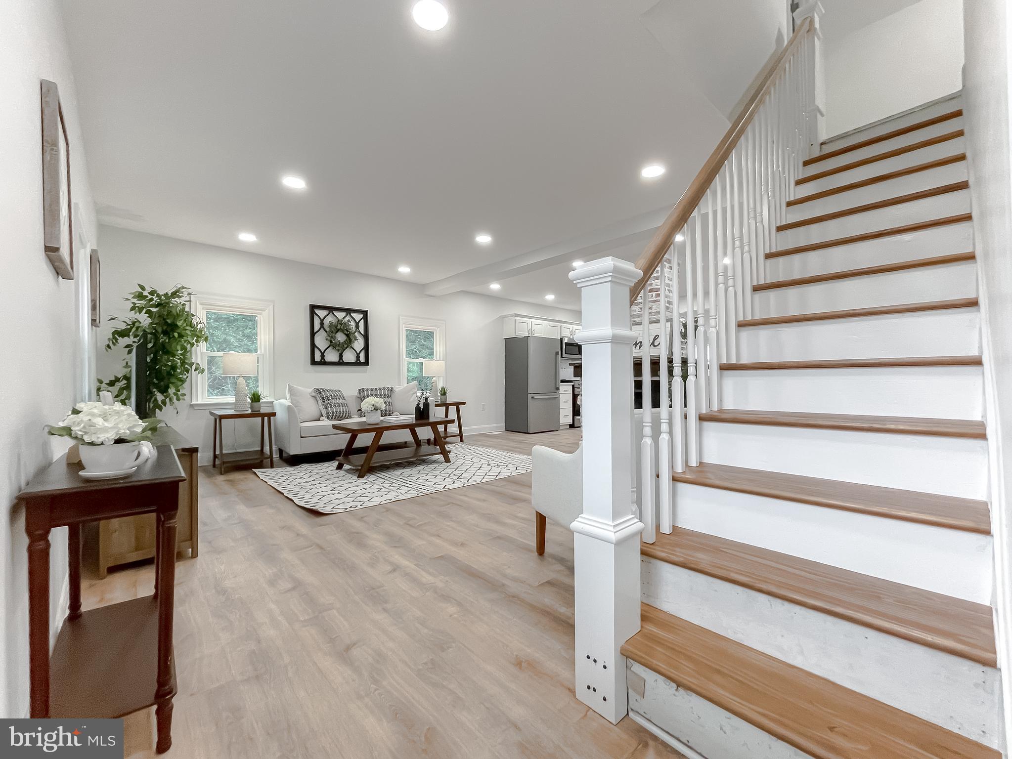 8285 Verne Place Welcome, MD 20693 - Photo 9 of 54 a living room with furniture and wooden floor