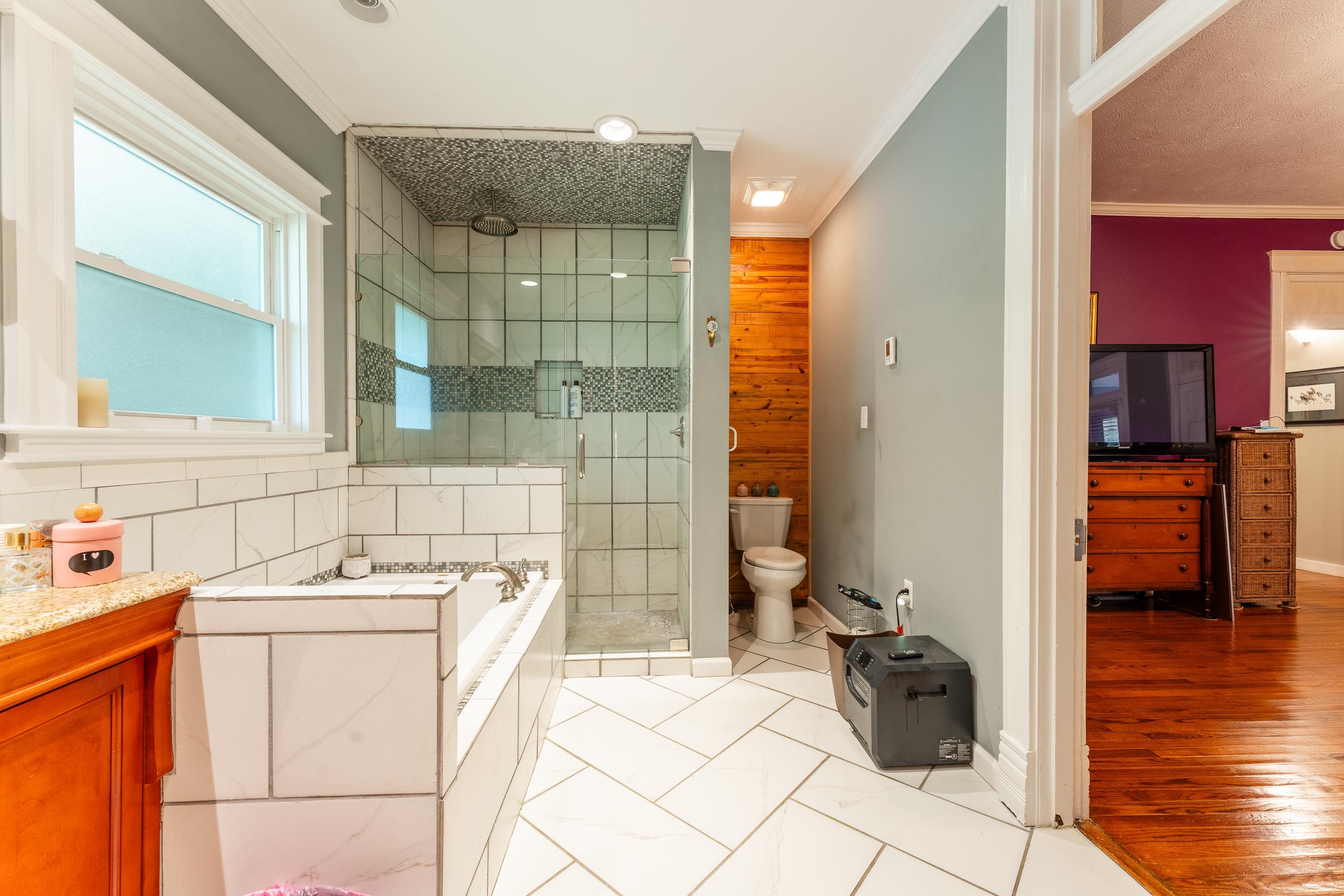 171 White Street Savannah, TN 38372 - Photo 11 of 36 a bathroom with a sink and a shower