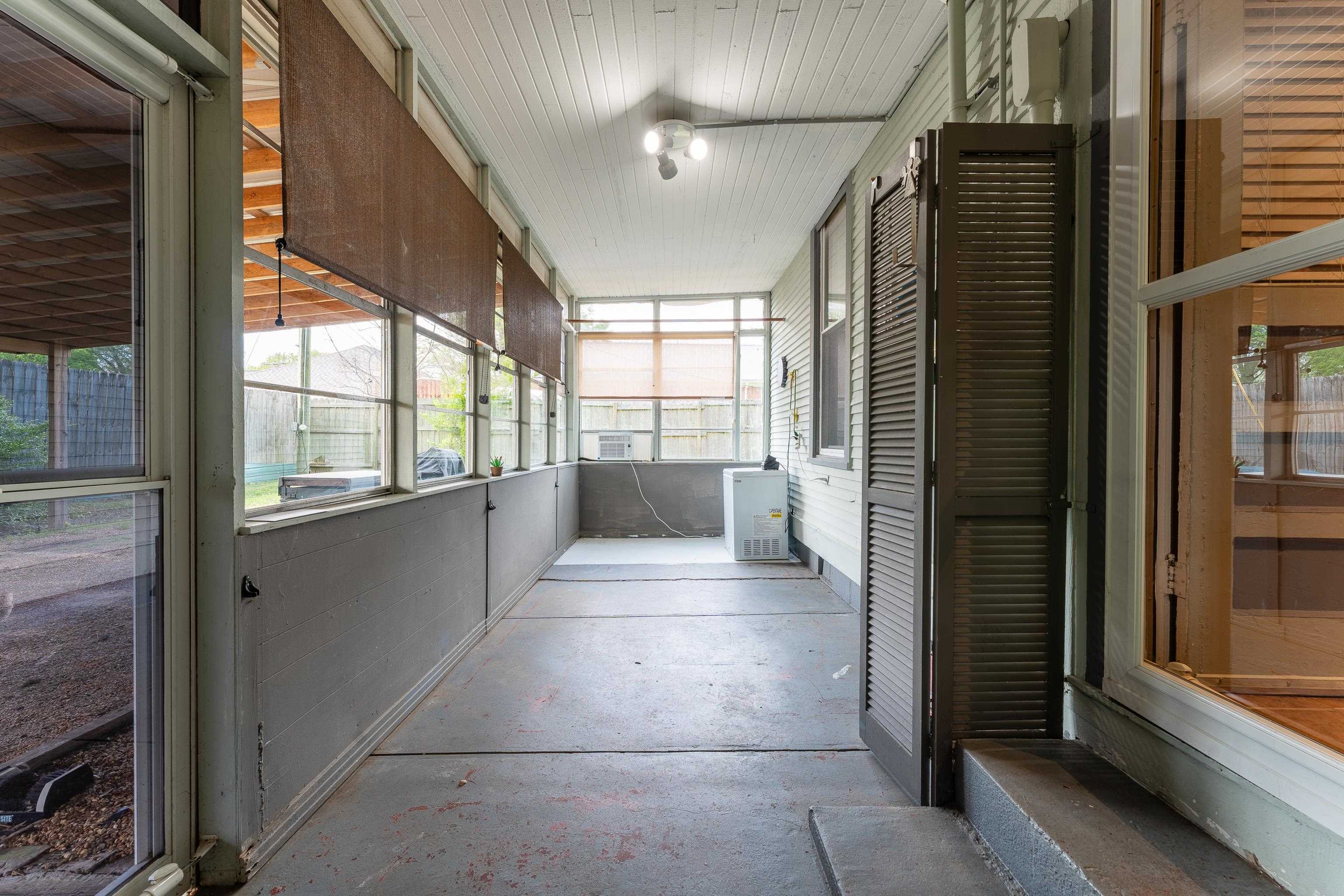 171 White Street Savannah, TN 38372 - Photo 27 of 36 a view of an entryway with wooden floor and windows