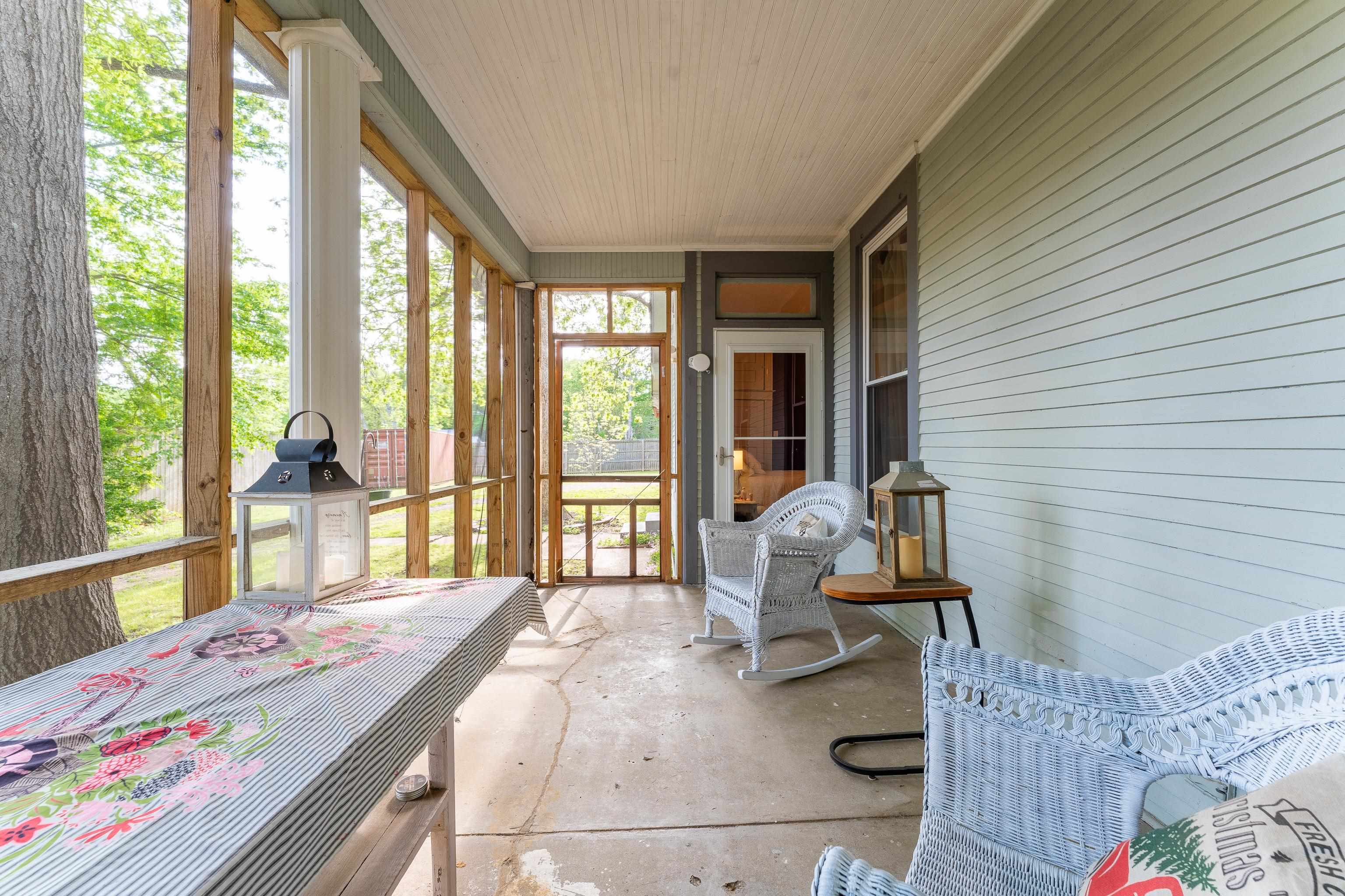 171 White Street Savannah, TN 38372 - Photo 28 of 36 a bedroom with a bed and large windows