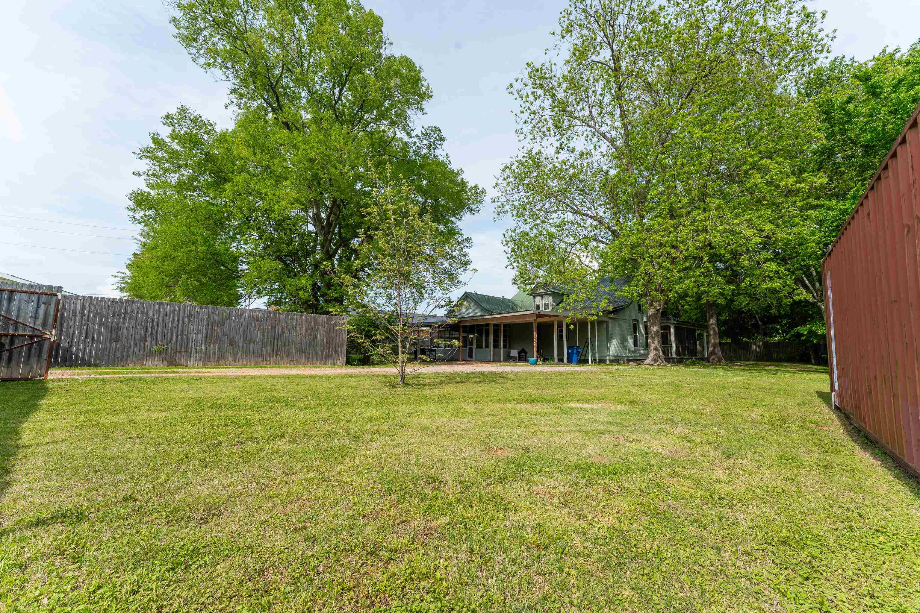 171 White Street Savannah, TN 38372 - Photo 30 of 36 a front view of house with yard and trees