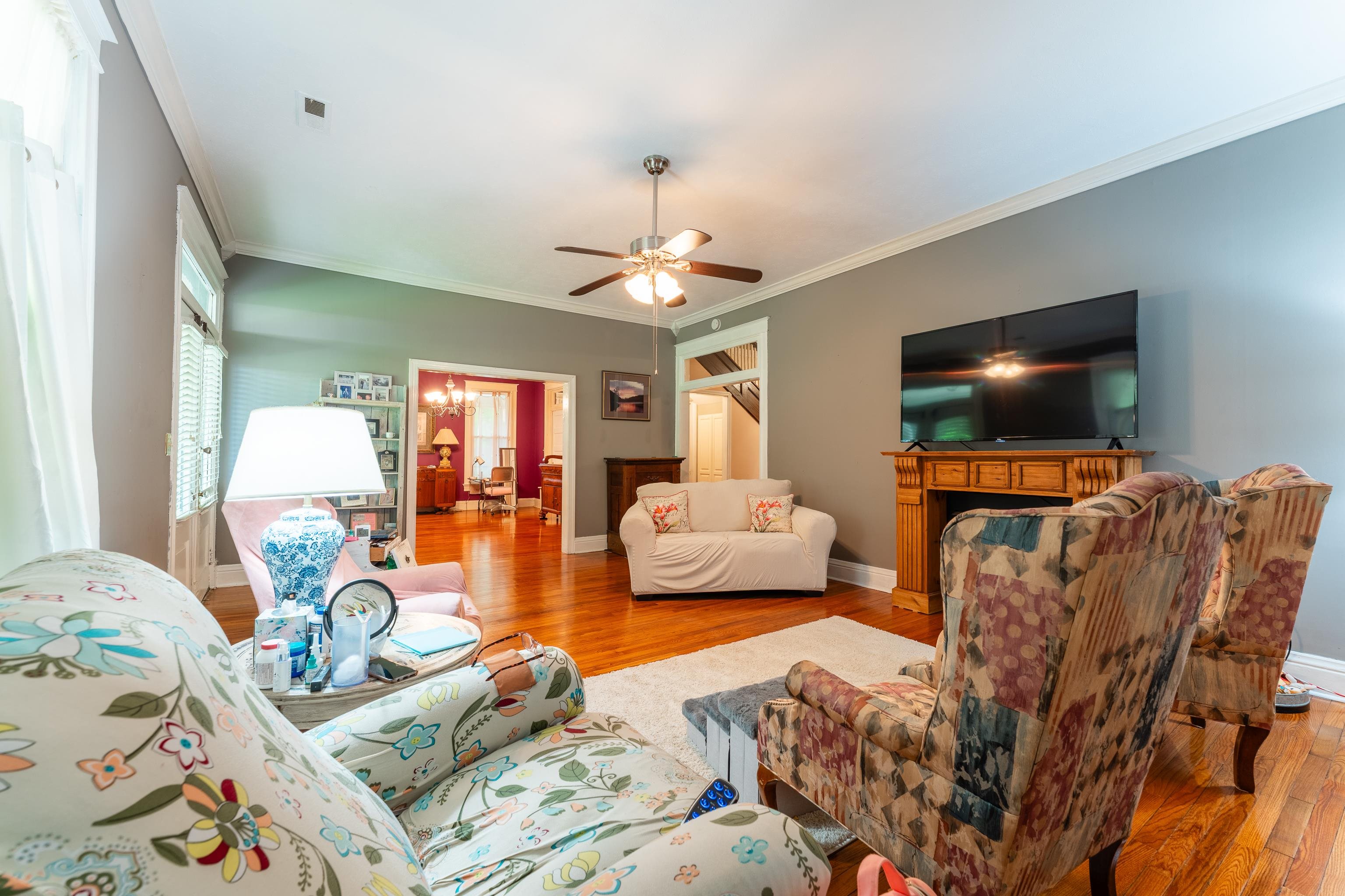 171 White Street Savannah, TN 38372 - Photo 7 of 36 a bedroom with furniture and a flat screen tv