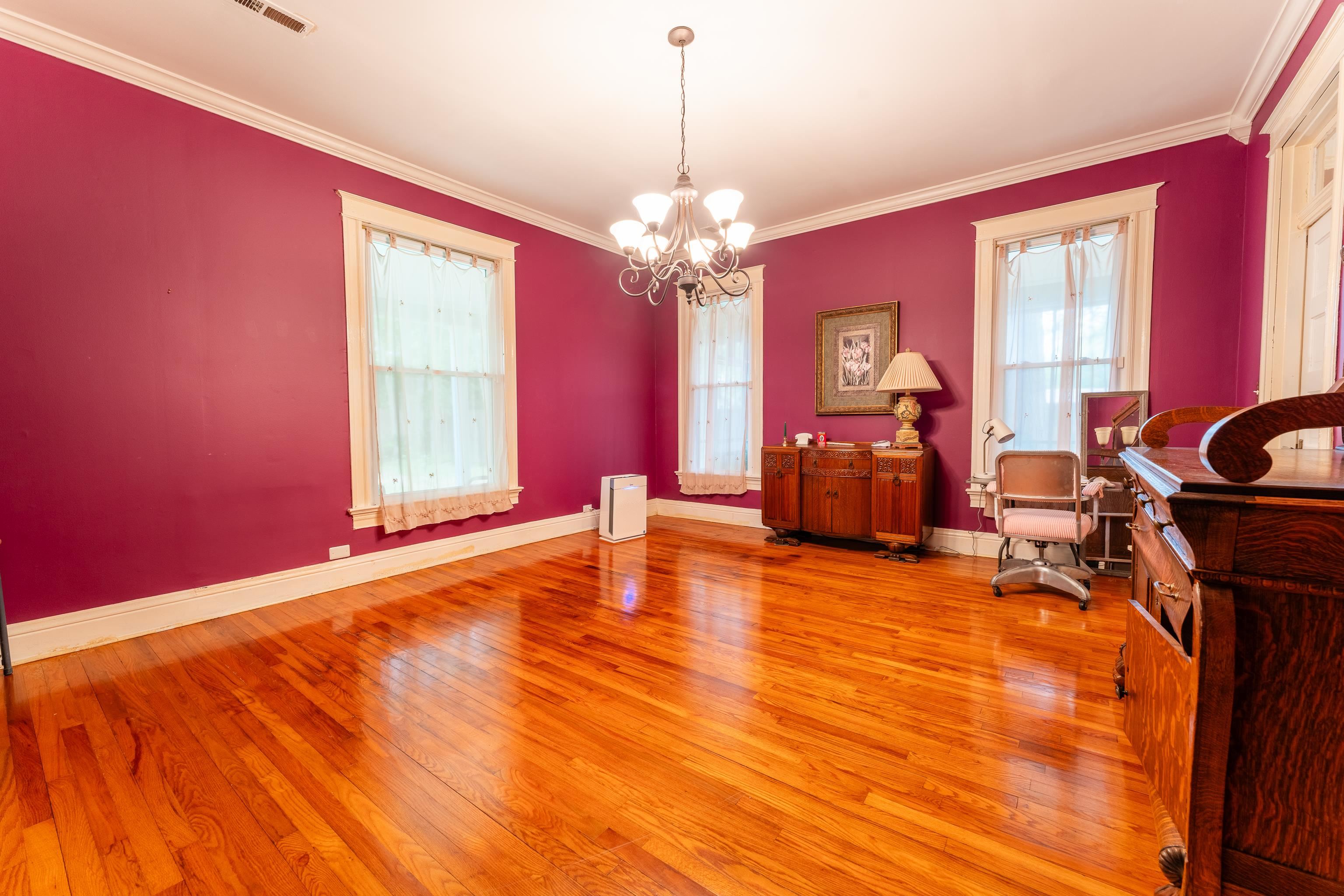 171 White Street Savannah, TN 38372 - Photo 8 of 36 a living room with furniture and a chandelier