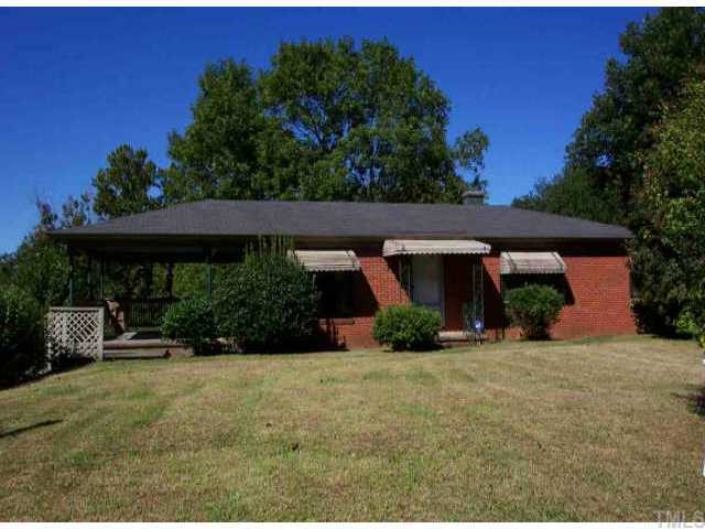1330 South State Street Raleigh, NC 27610 - Photo 1 of 1 front view of a house with a yard