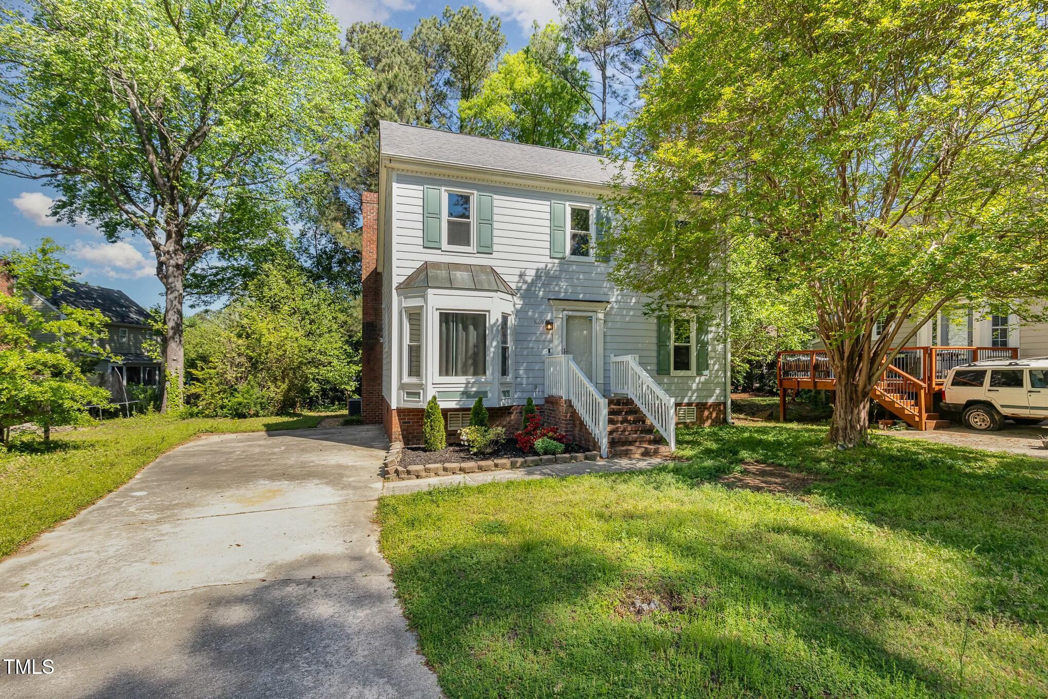 3109 East Folkestone Place Raleigh, NC 27604 - Photo 1 of 25 a view of a house with backyard