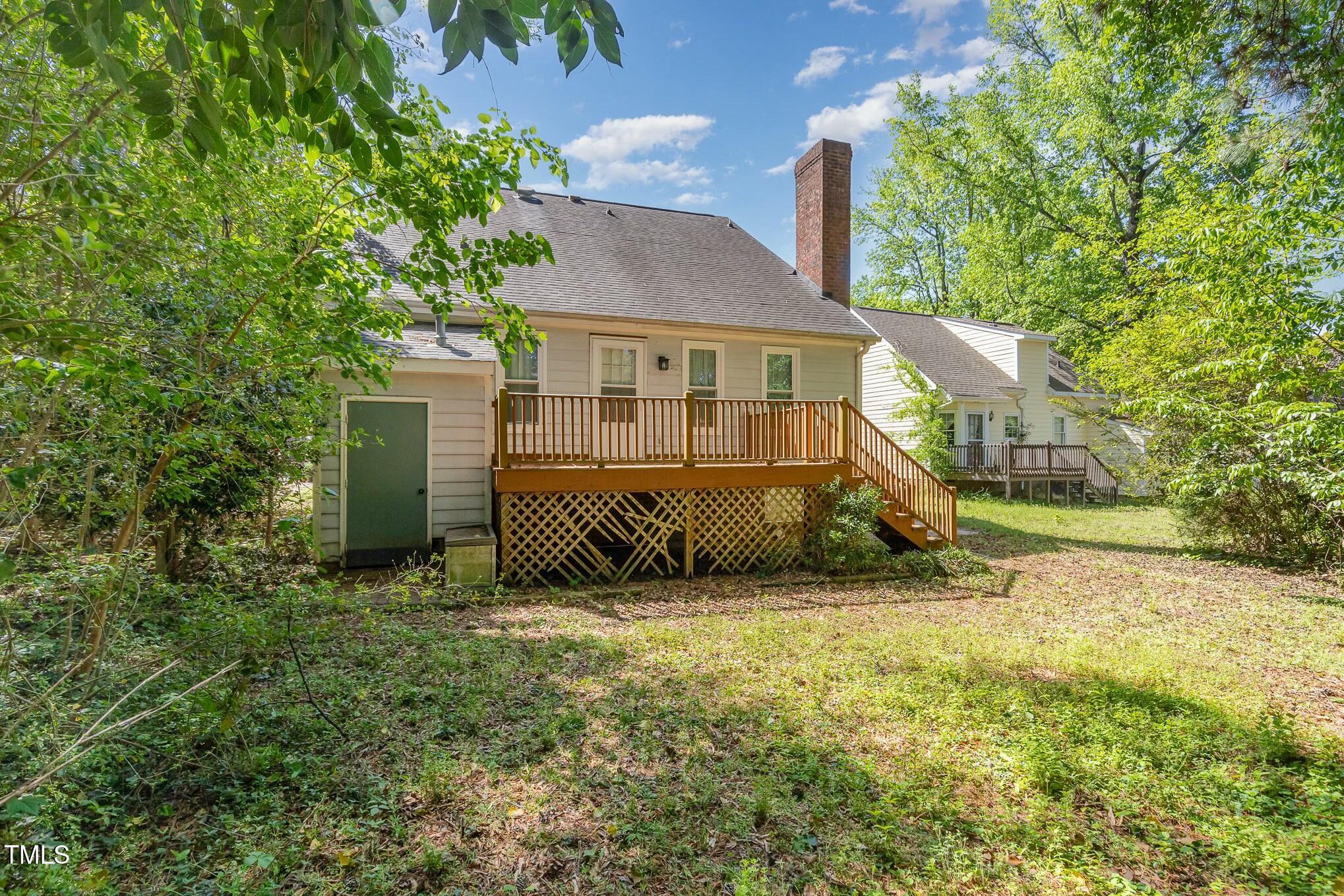 3109 East Folkestone Place Raleigh, NC 27604 - Photo 25 of 25 a view of a house with a yard