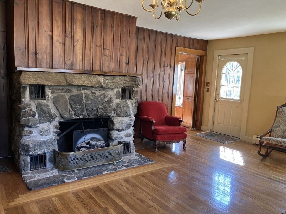 9 Brimfield Road Monson, MA 01057 - Photo 12 of 27 a living room with furniture and a fireplace