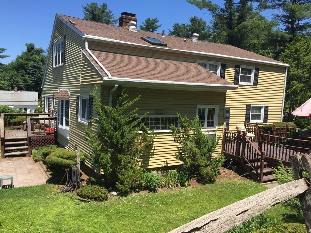 9 Brimfield Road Monson, MA 01057 - Photo 2 of 27 a house view with a garden space