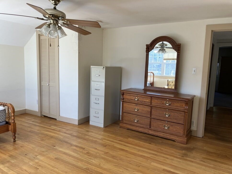 9 Brimfield Road Monson, MA 01057 - Photo 26 of 27 a room with a dresser and a mirror