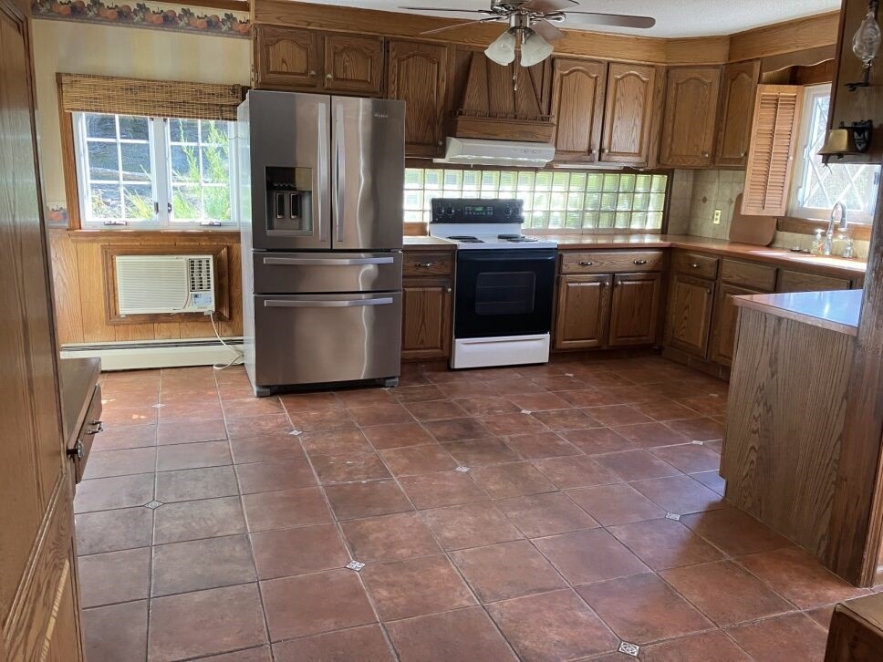 9 Brimfield Road Monson, MA 01057 - Photo 4 of 27 a kitchen with stainless steel appliances granite countertop a stove a sink and a refrigerator