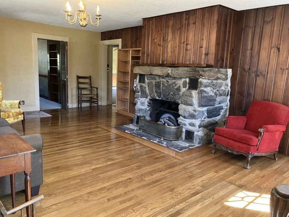 9 Brimfield Road Monson, MA 01057 - Photo 10 of 27 a living room with furniture and a fireplace