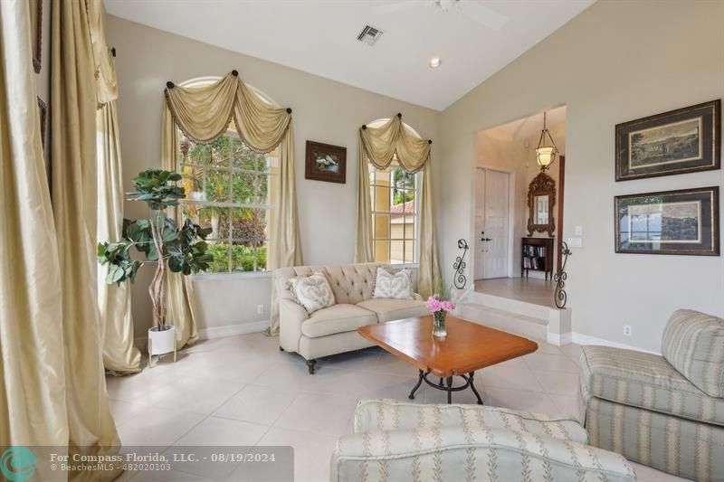 2515 Montclaire Circle Weston, FL 33327 - Photo 11 of 51 a living room with patio furniture and a potted plant