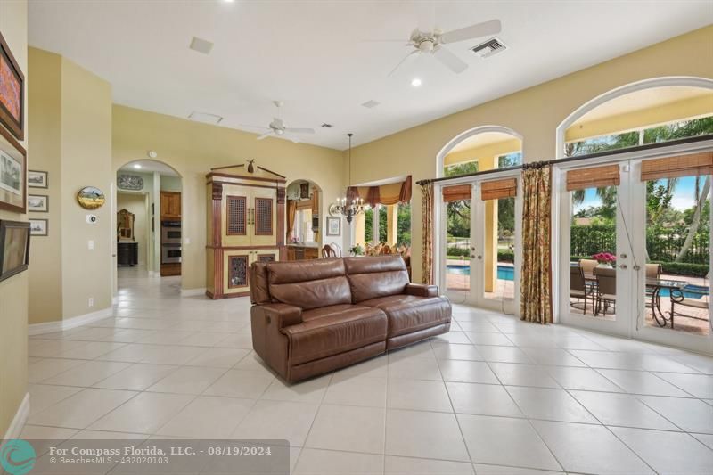 2515 Montclaire Circle Weston, FL 33327 - Photo 15 of 51 a living room with furniture and large windows