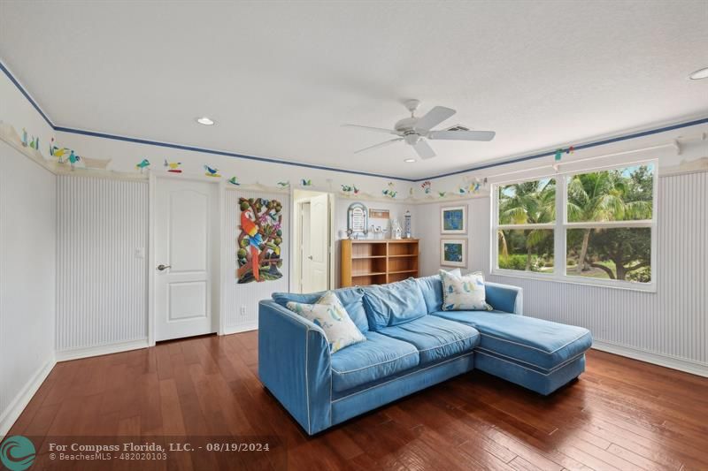 2515 Montclaire Circle Weston, FL 33327 - Photo 24 of 51 a living room with furniture and a large window