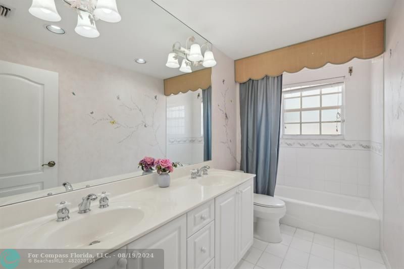 2515 Montclaire Circle Weston, FL 33327 - Photo 29 of 51 a bathroom with a sink a toilet and shower