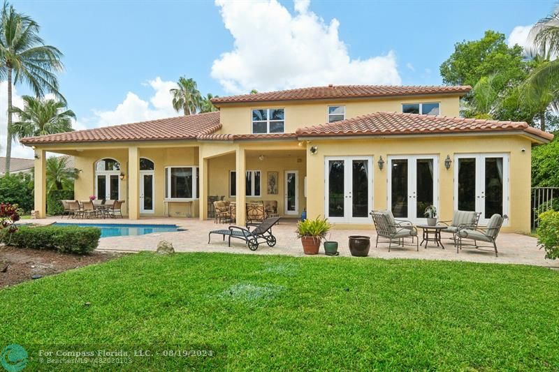 2515 Montclaire Circle Weston, FL 33327 - Photo 39 of 51 a view of a house with a yard and sitting area