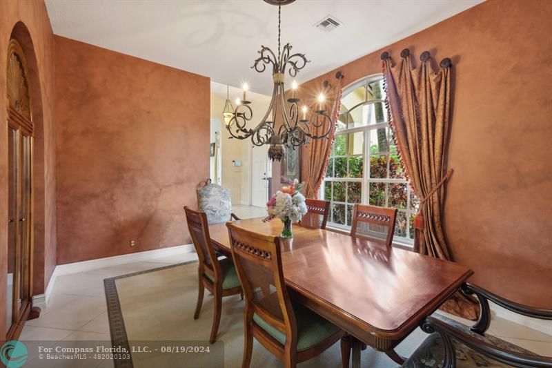 2515 Montclaire Circle Weston, FL 33327 - Photo 9 of 51 a view of a dining room with furniture window and outside view