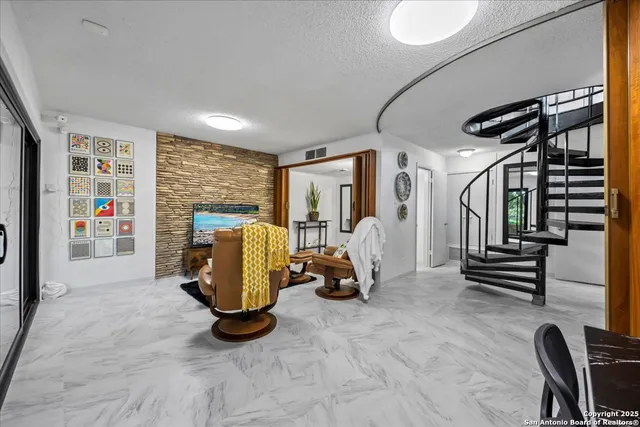 a living room with a couch and a table