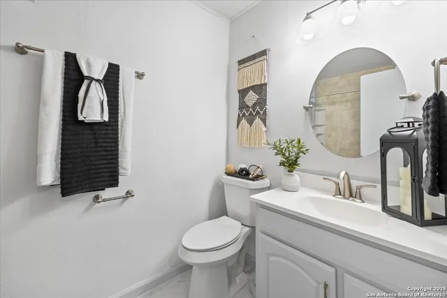 a view of a street with a yard and mountain view