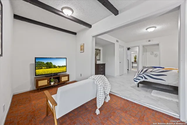 a dining room with furniture window and outdoor view