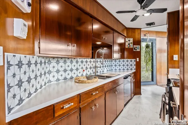 a view of a forest with a houses