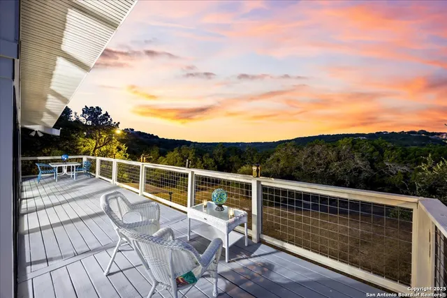 a view of a roof deck with couches