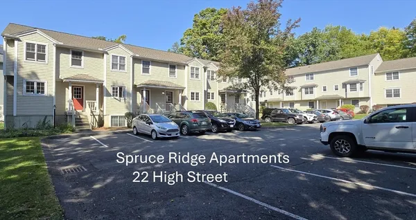 a view of street with parked cars