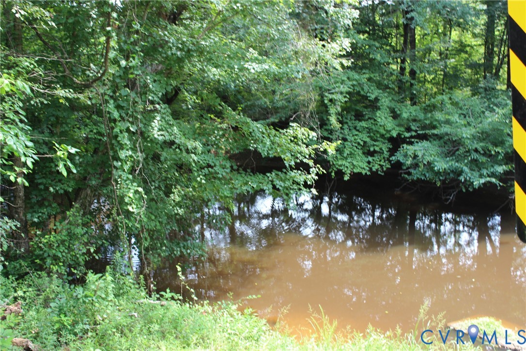 0 White Oak Road Dewitt, VA 23840 - Photo 3 of 9 The stream follows the property edge for over 1500