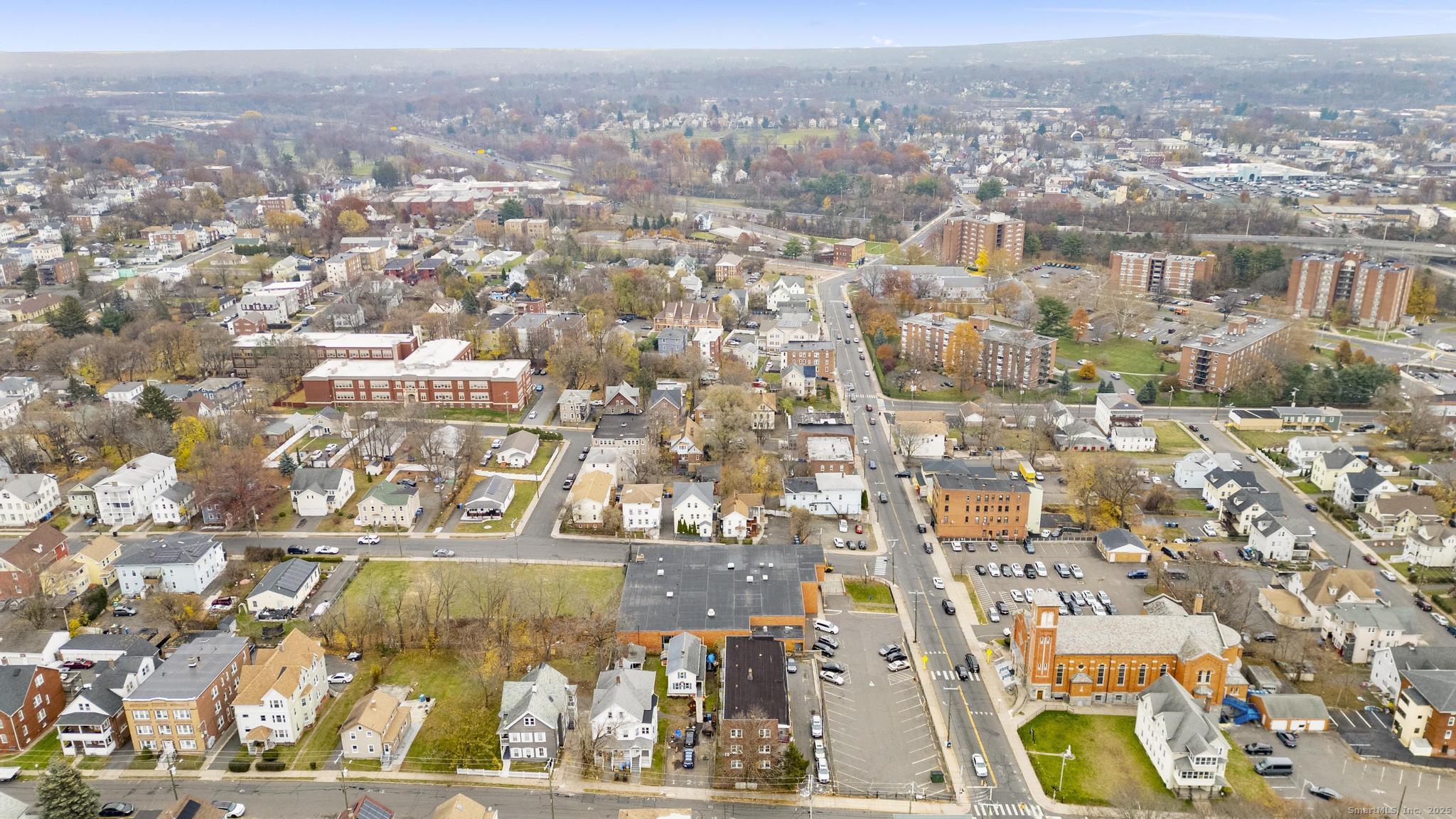 75 Clark Street New Britain, CT 06051 - Photo 13 of 14 an aerial view of residential building and parking space