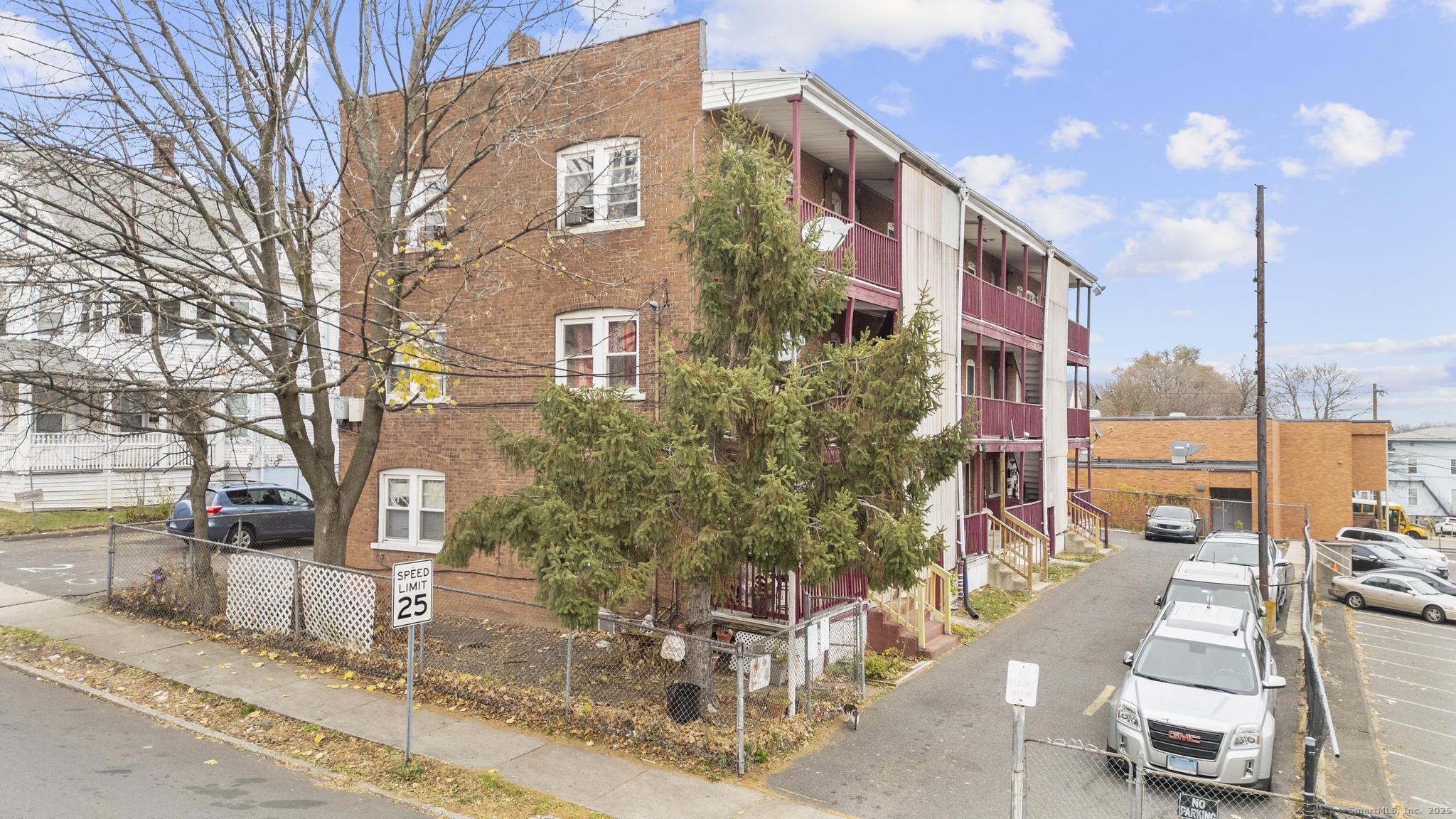 75 Clark Street New Britain, CT 06051 - Photo 10 of 14 a front view of a building with street view