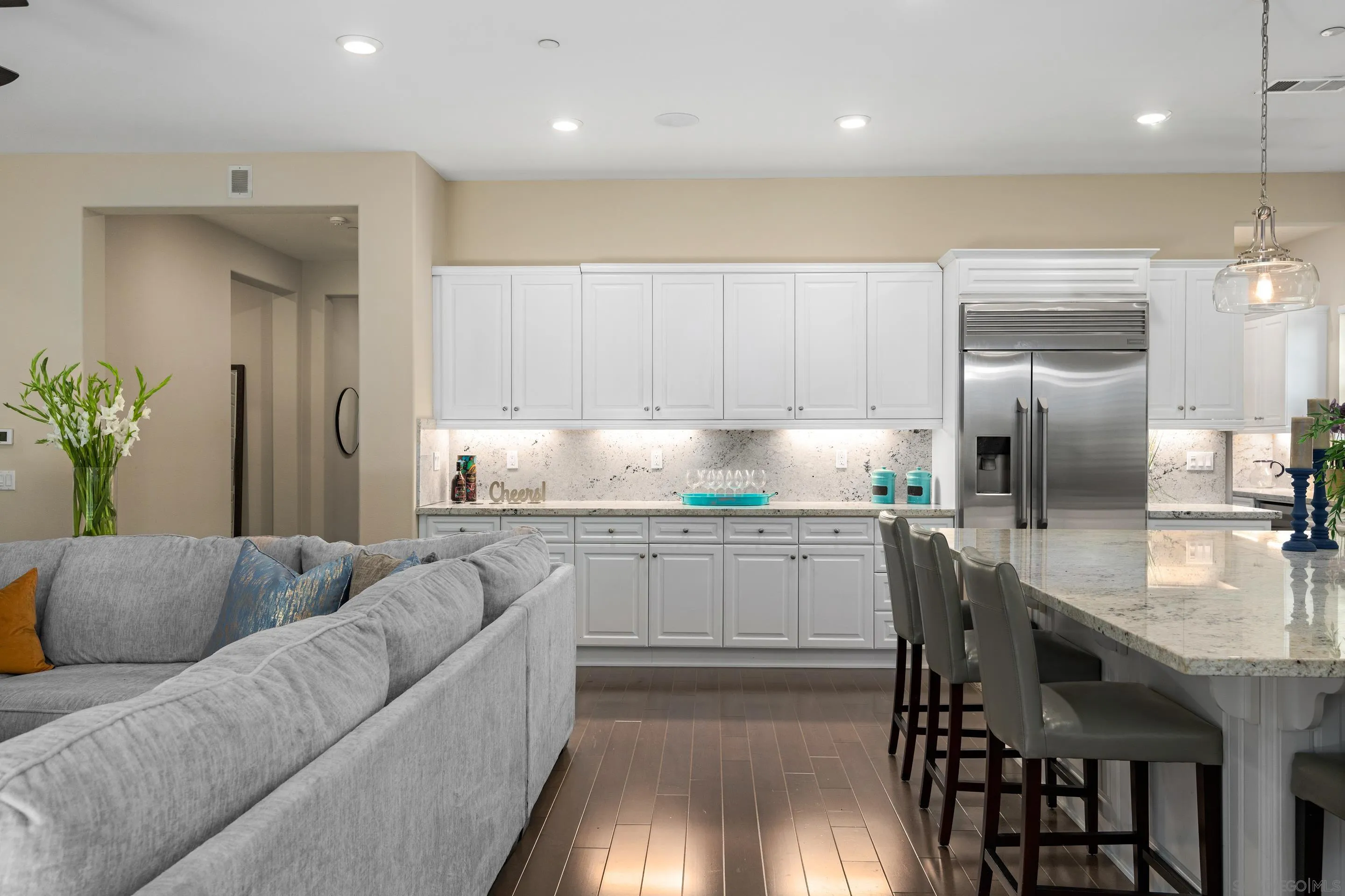 5401 Reef Circle Carlsbad, CA 92008 - Photo 17 of 45 a kitchen with stainless steel appliances granite countertop a refrigerator and a stove top oven