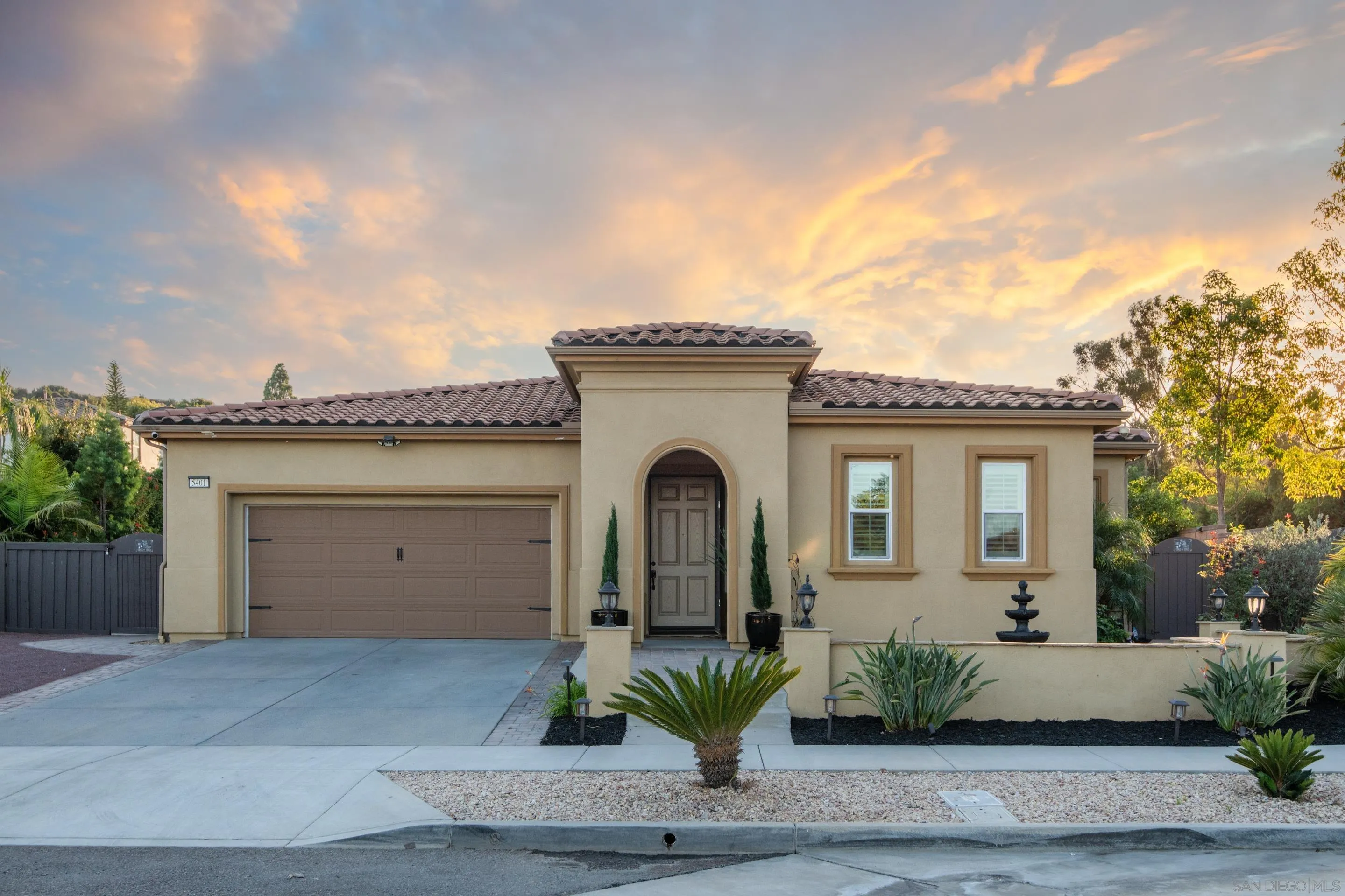 5401 Reef Circle Carlsbad, CA 92008 - Photo 2 of 45 a front view of a house with shower