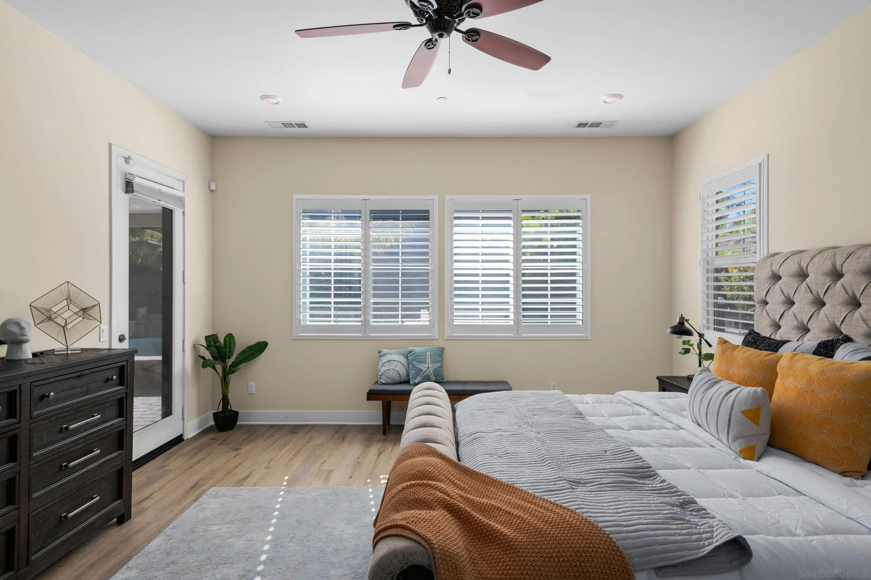 5401 Reef Circle Carlsbad, CA 92008 - Photo 21 of 45 a bedroom with a bed and a window