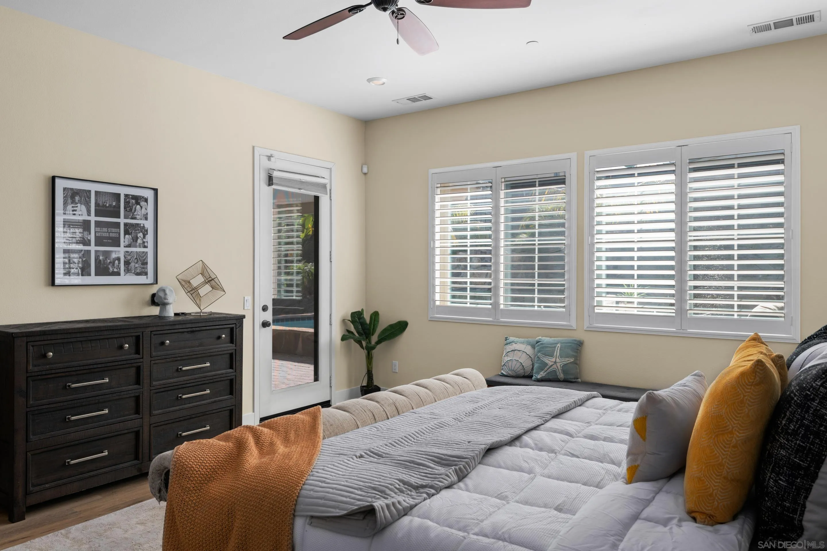 5401 Reef Circle Carlsbad, CA 92008 - Photo 22 of 45 a bedroom with a bed and a window