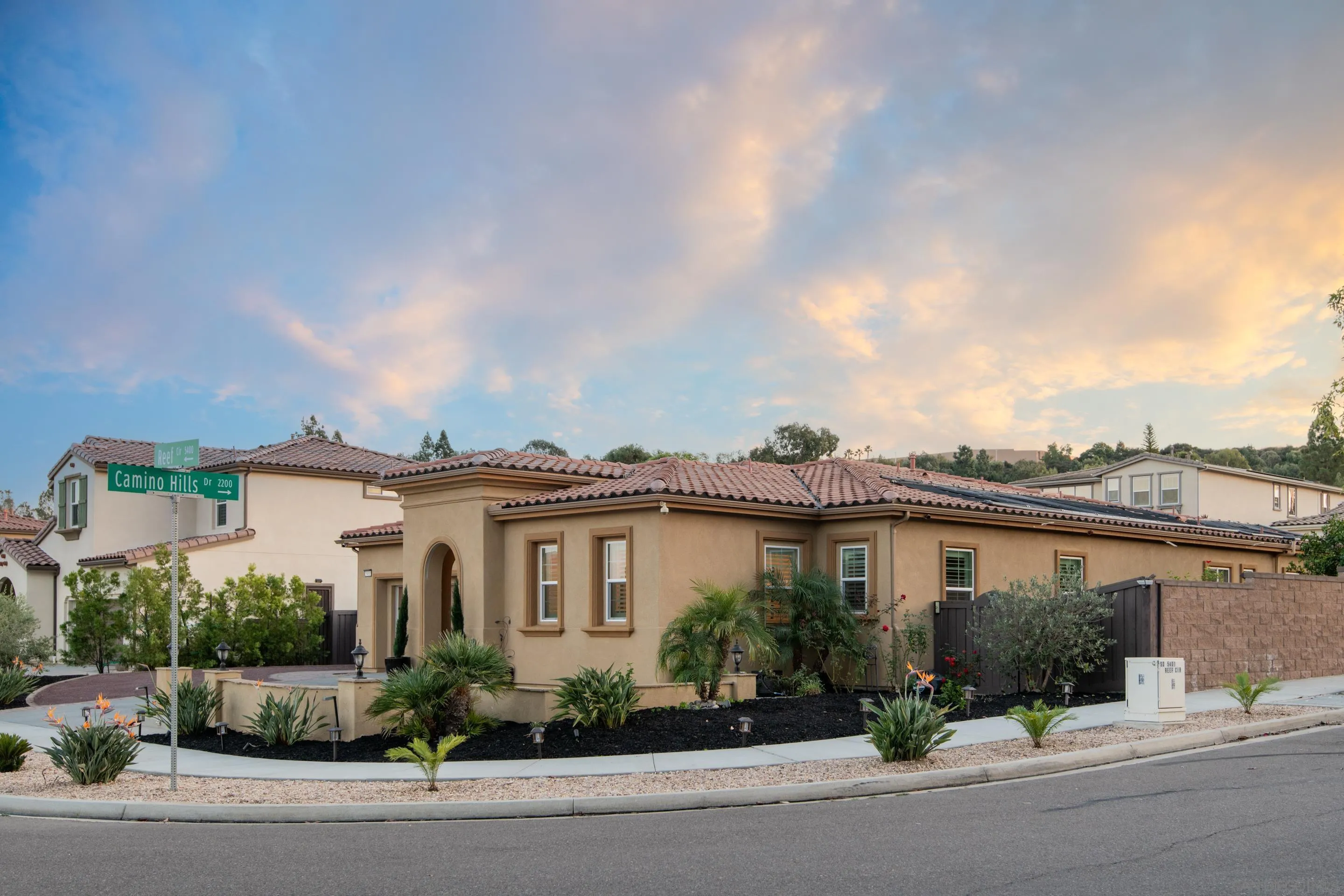5401 Reef Circle Carlsbad, CA 92008 - Photo 3 of 45 front view of a house with a yard