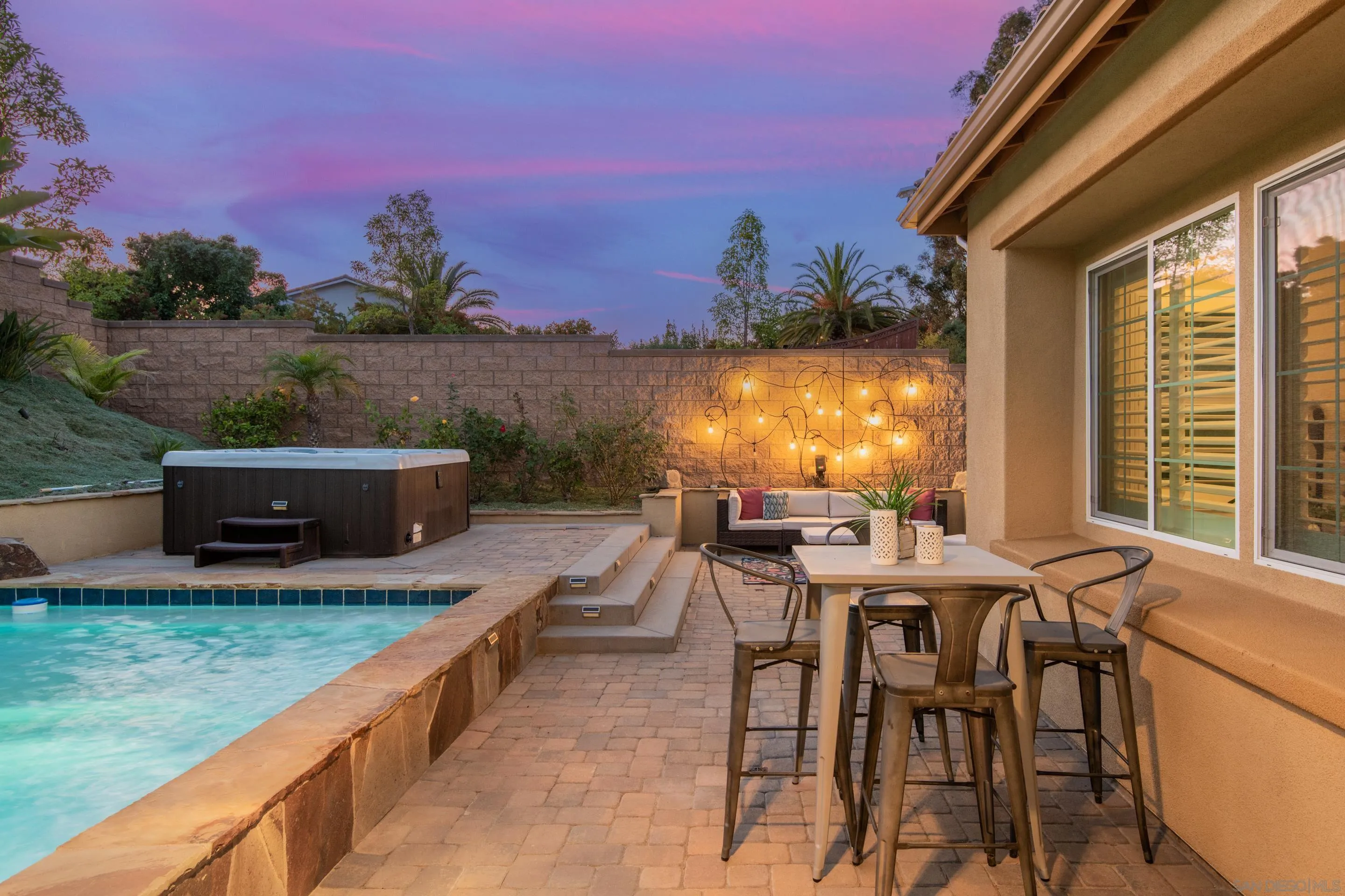 5401 Reef Circle Carlsbad, CA 92008 - Photo 40 of 45 a view of a chairs and table in patio with a yard
