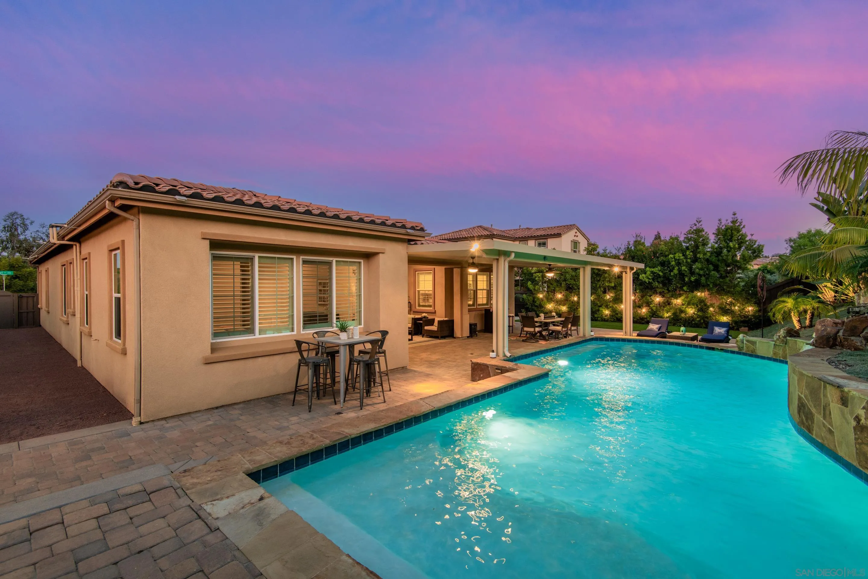 5401 Reef Circle Carlsbad, CA 92008 - Photo 41 of 45 a view of a house with a yard porch and sitting area
