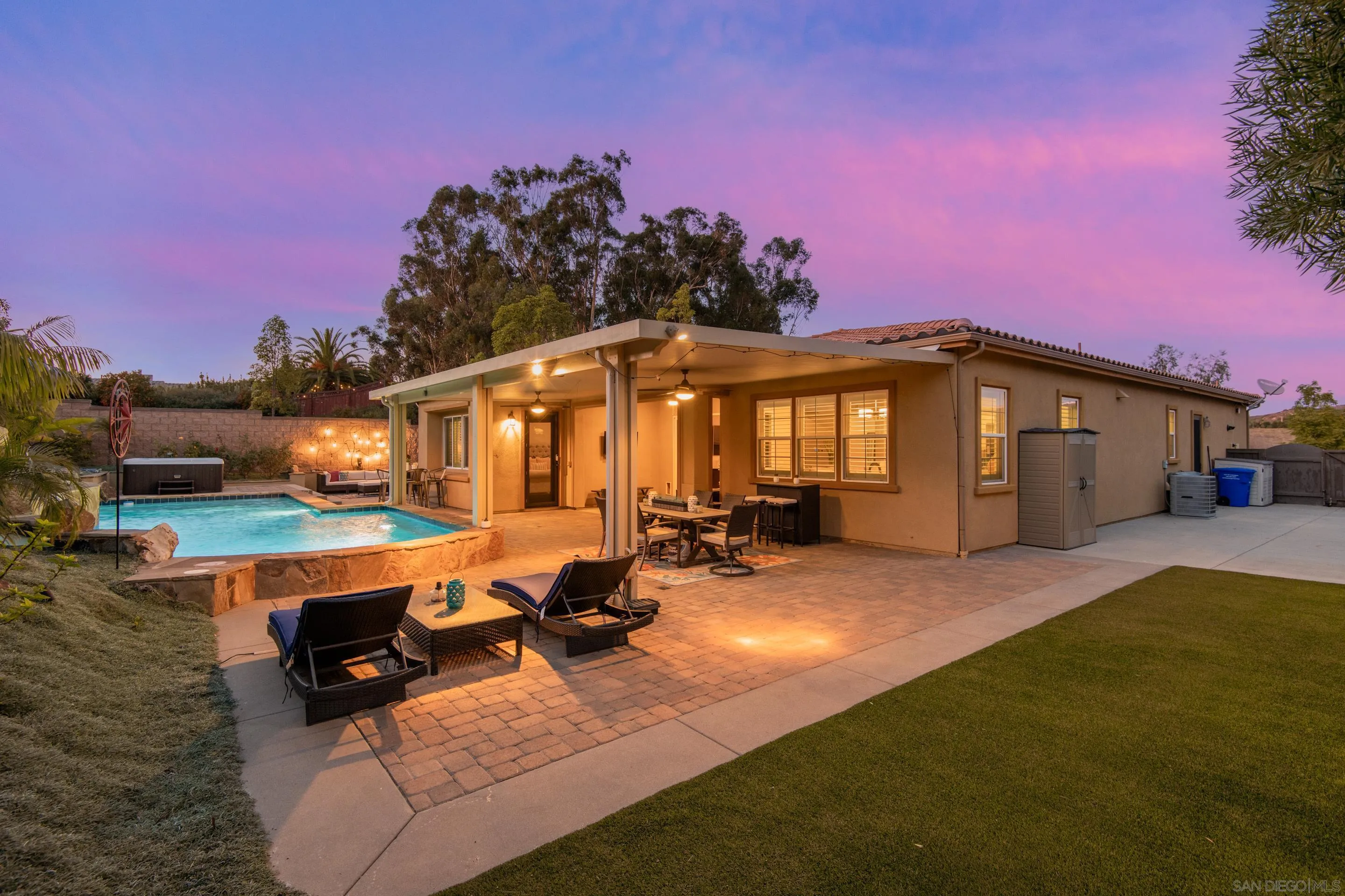 5401 Reef Circle Carlsbad, CA 92008 - Photo 43 of 45 a view of a house with backyard porch and sitting area