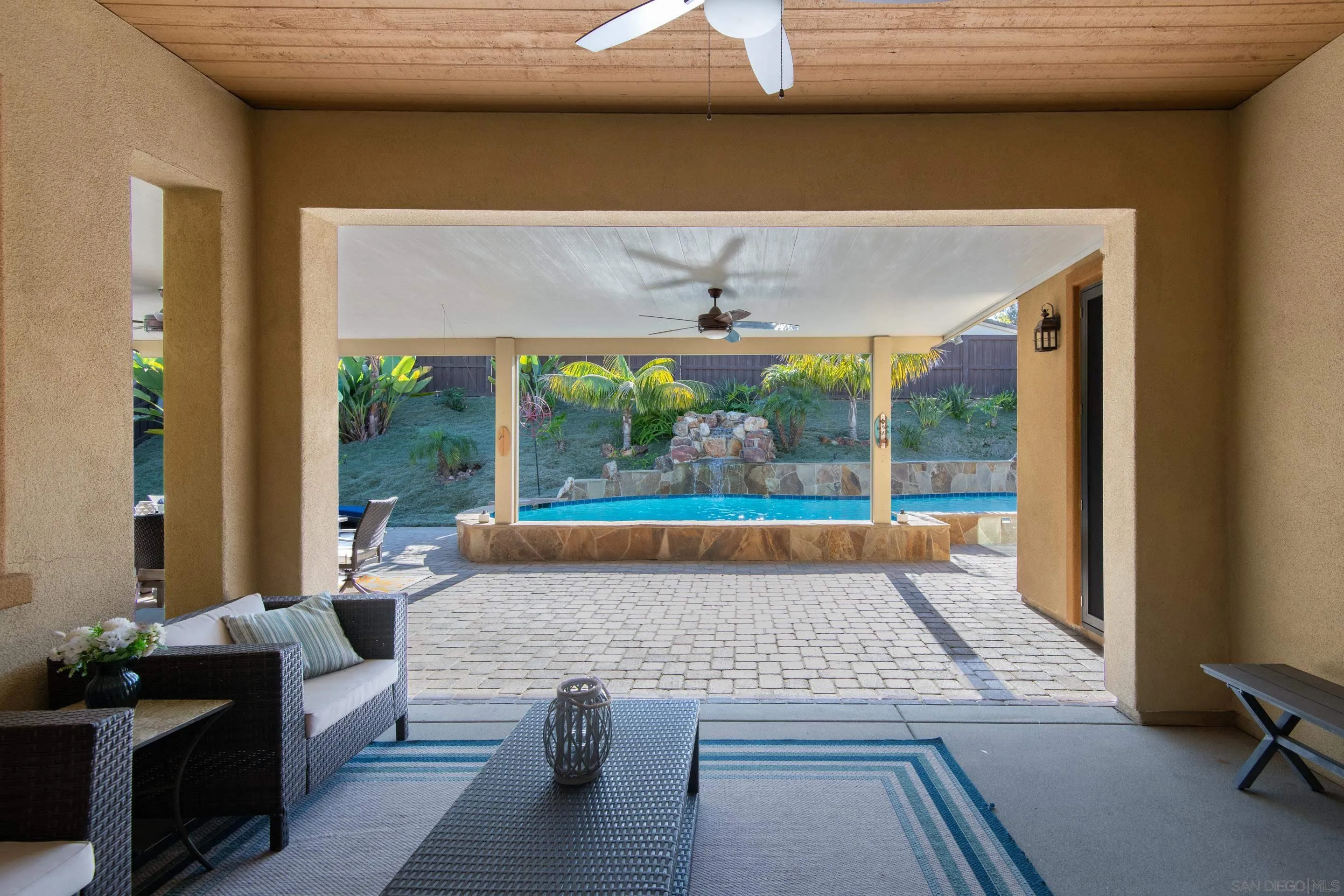 5401 Reef Circle Carlsbad, CA 92008 - Photo 8 of 45 a living room with furniture and a large window