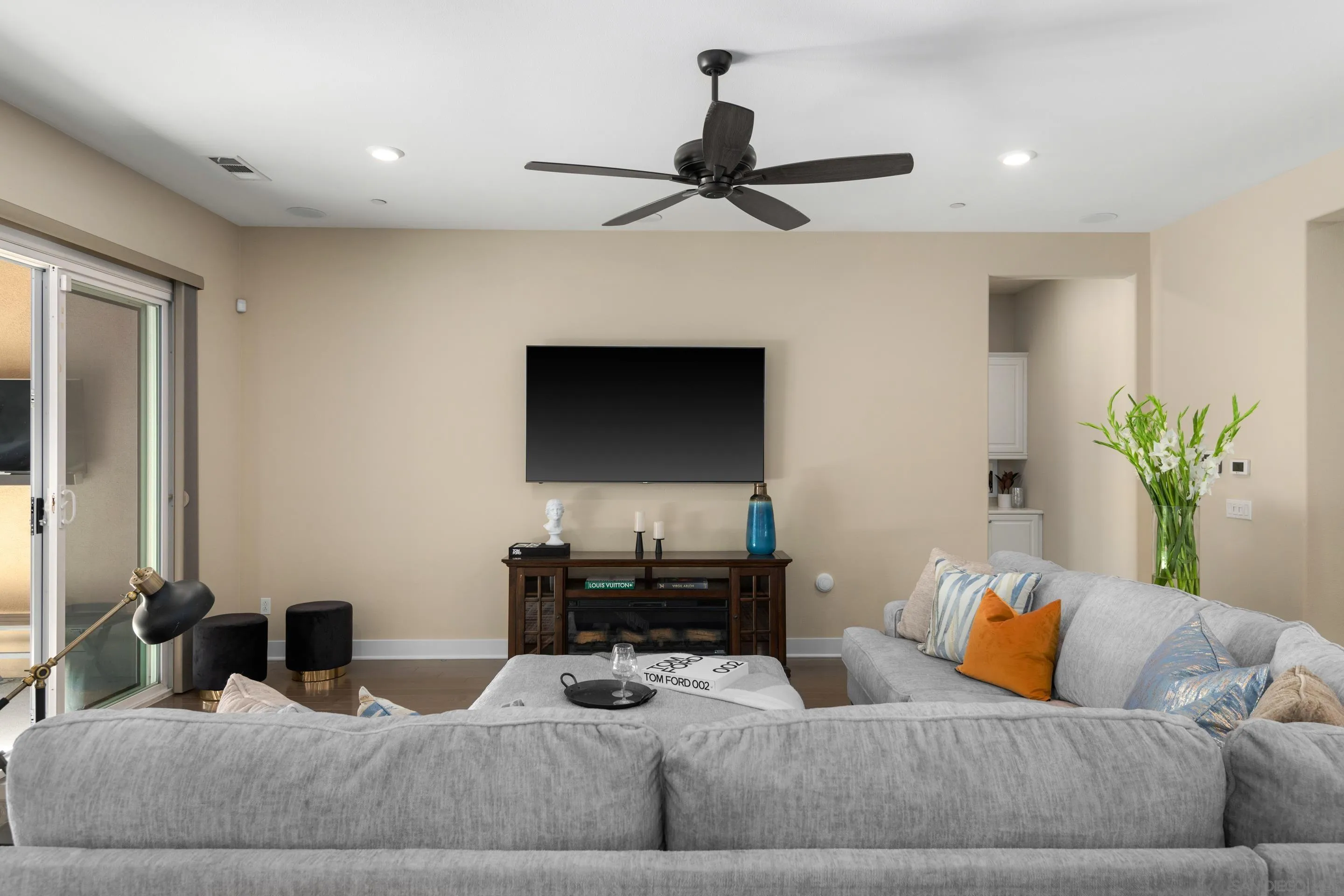 5401 Reef Circle Carlsbad, CA 92008 - Photo 10 of 45 a living room with furniture and a flat screen tv