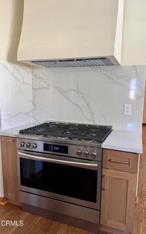 a close view of sink and cabinets