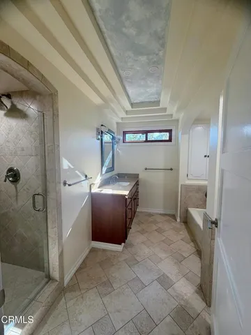 a white bath tub sitting in a bathroom