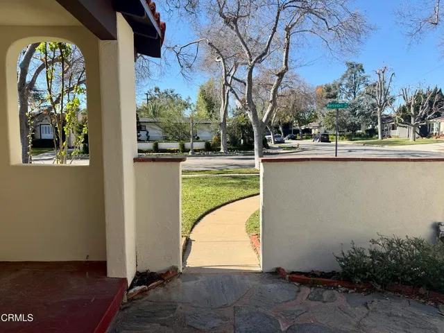 a view of a swimming pool with a backyard