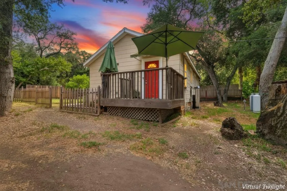 2275 Honey Springs Road Jamul, CA 91935 - Photo 1 of 17 a small garden covered with tall trees